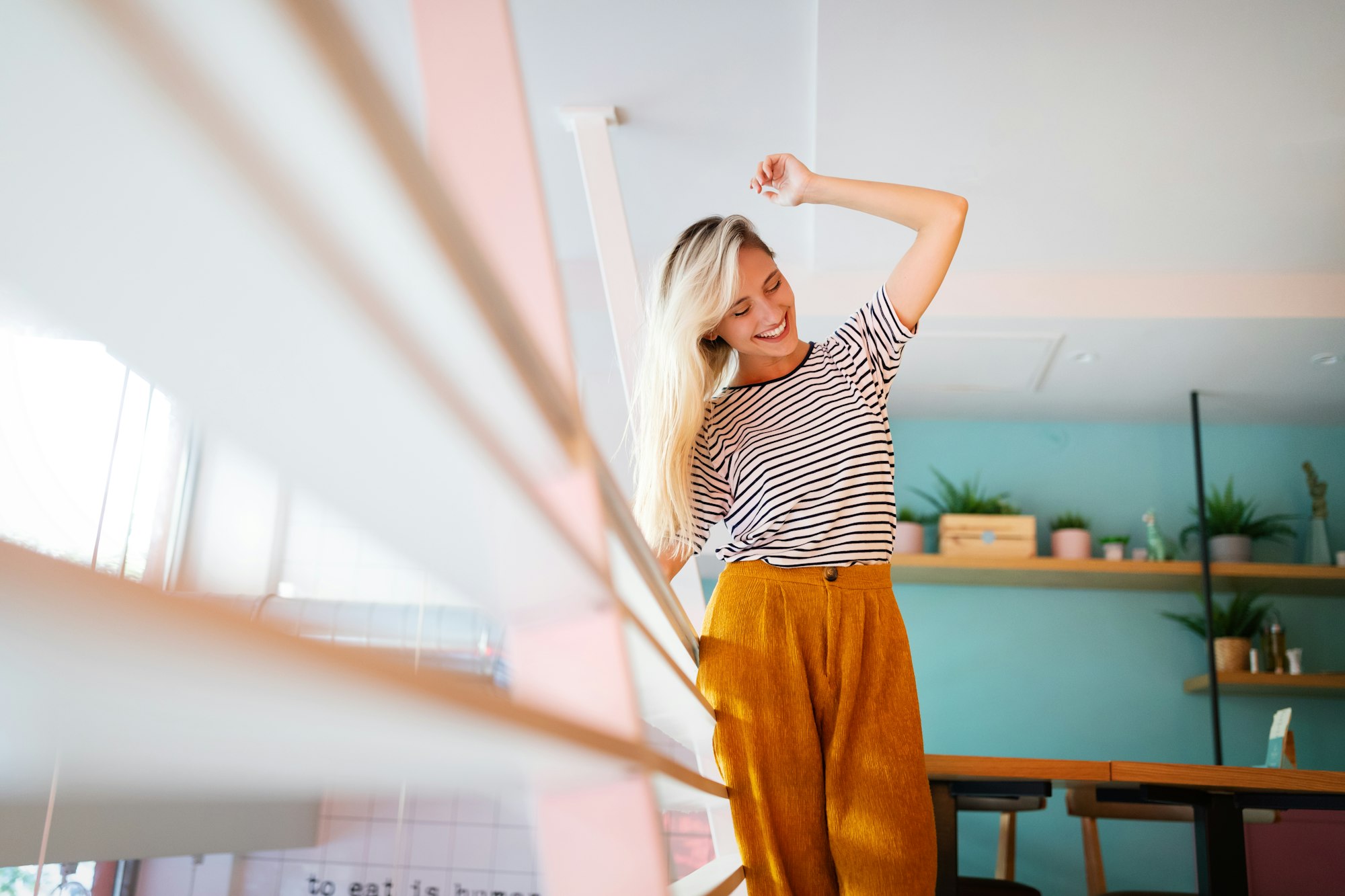 Portrait of beautiful young happy woman smiling and having fun